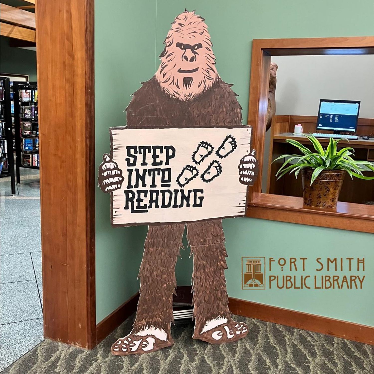 bigfoot with step into reading sign