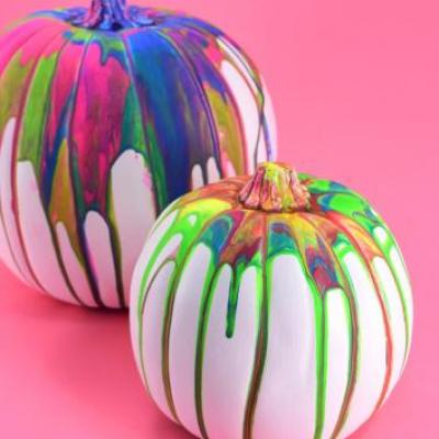 Pumpkins painted using a pour paint technique