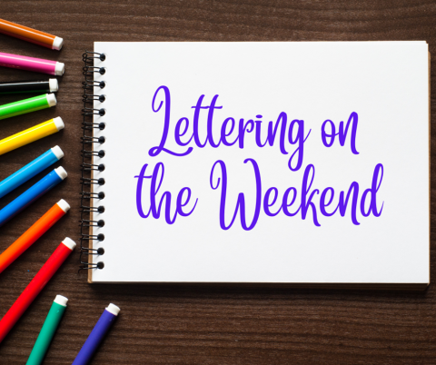 pad of paper with "Lettering on the Weekend" and a selection of markers